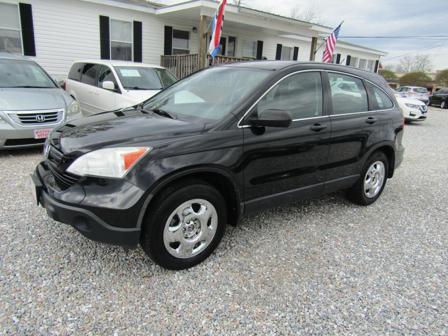 2009 Black Honda CR-V LX 2WD 5-Speed AT (3CZRE383X9G) with an 2.4L L4 DOHC 16V engine, Automatic transmission, located at 15016 S Hwy 231, Midland City, AL, 36350, (334) 983-3001, 31.306210, -85.495277 - Photo#2